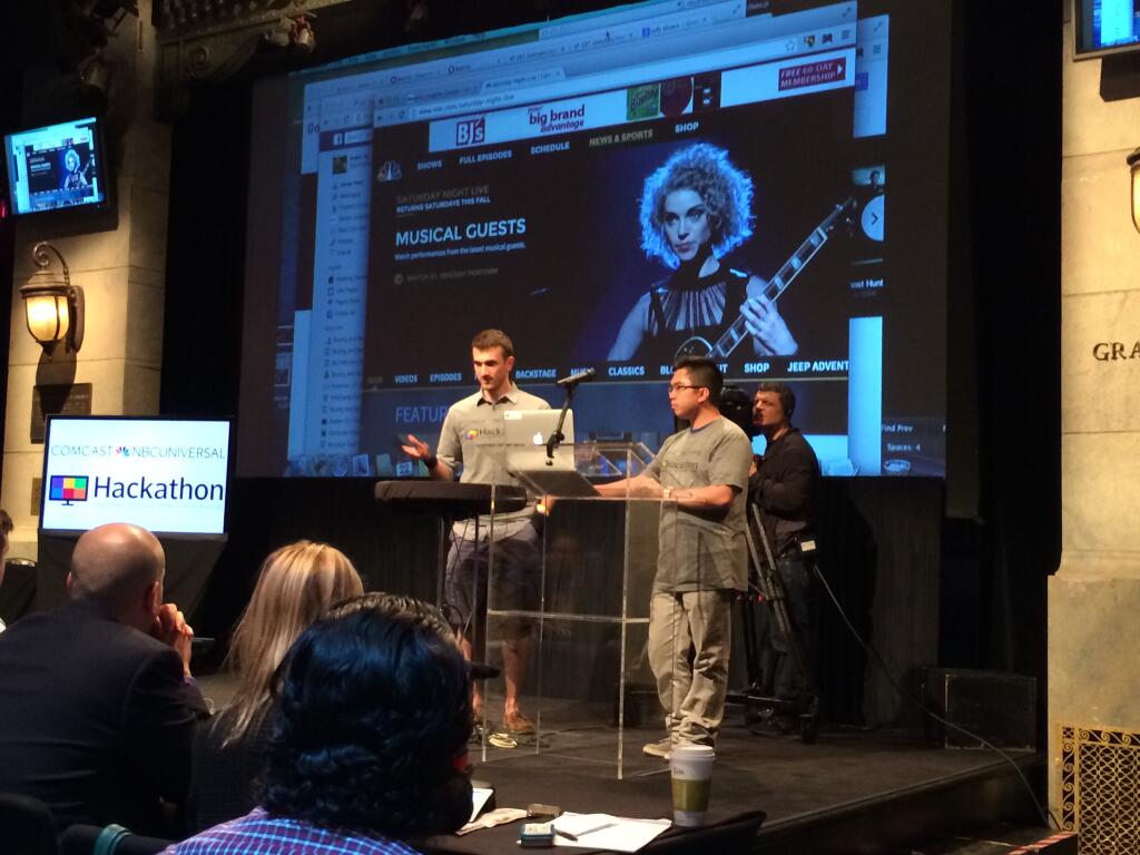 Team presenting at NBC Comcast Universal Hackathon 2014